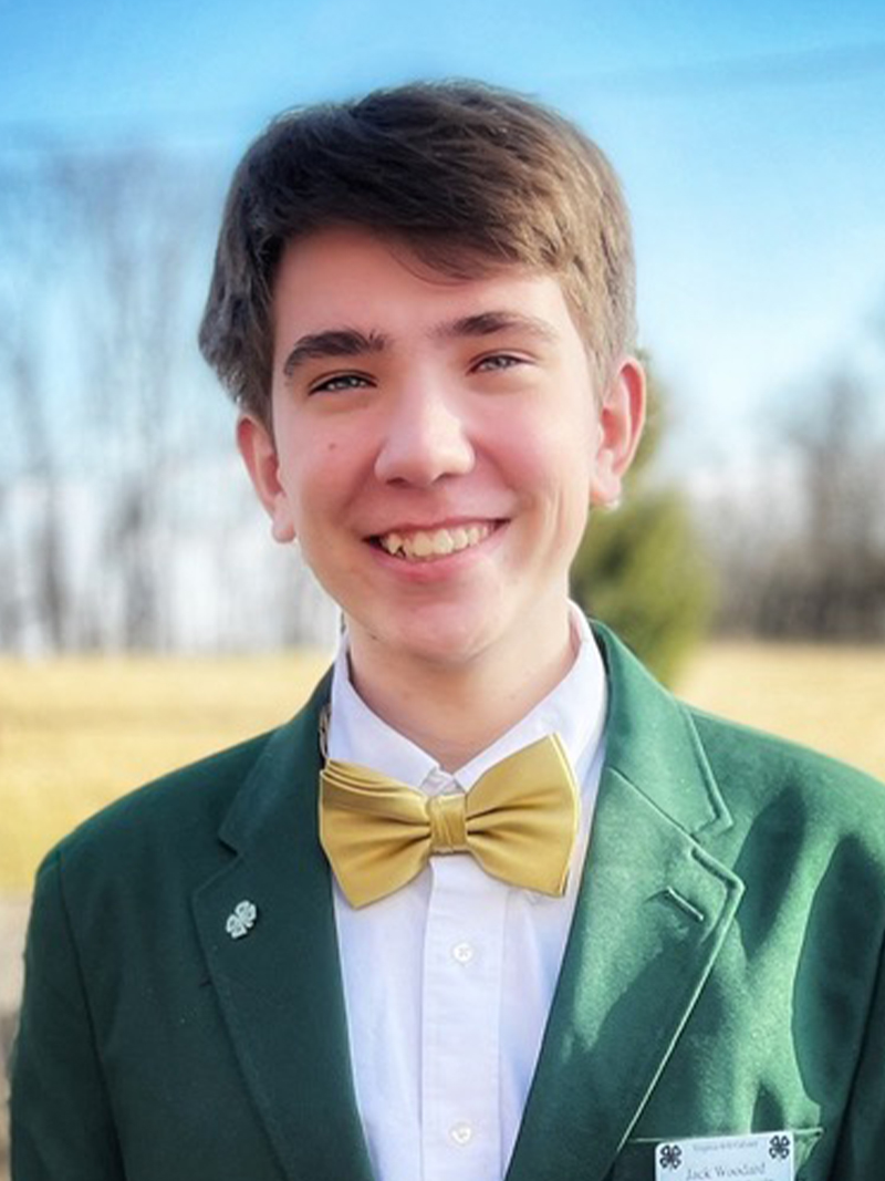 Young man dressed in green business jacket