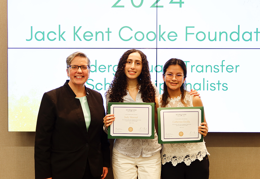 President Kress stands with Judy Marouf and Catherine Ercilla as they pose with their certificates.